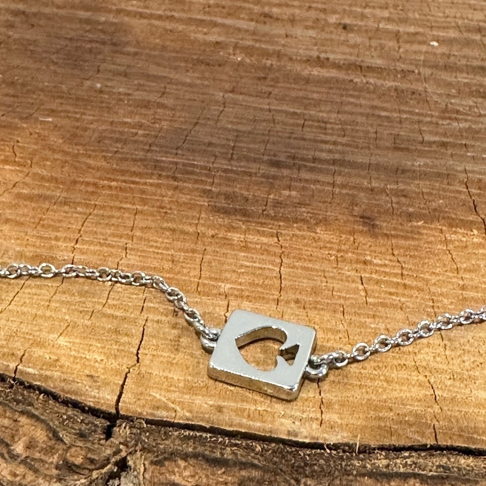 Kate Spade Silver Necklace with Gold Heart Accents - Picture 2 of 6